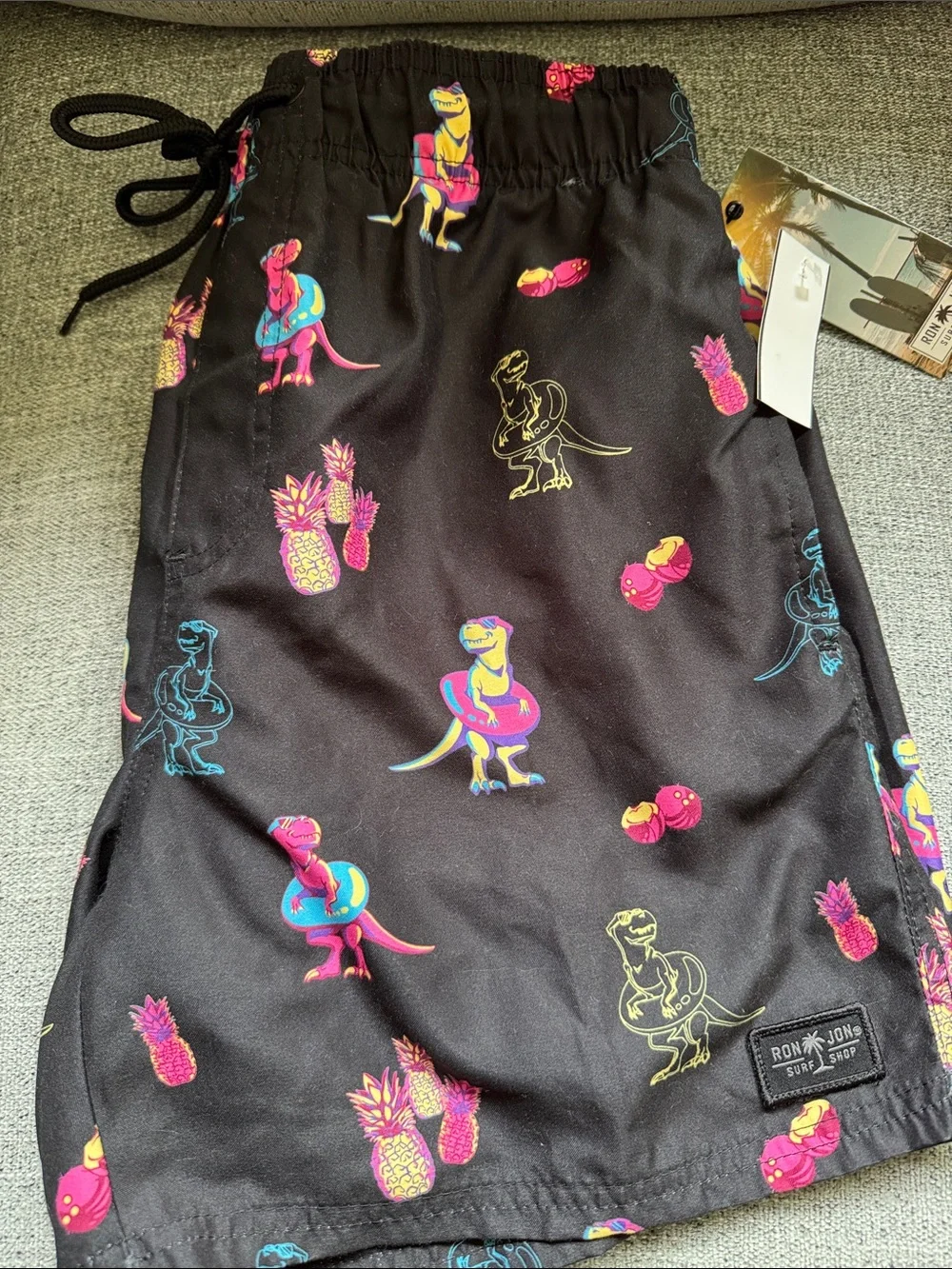 Ron Jon Black Swim Trunks with Neon Dinosaur & Pineapple Print